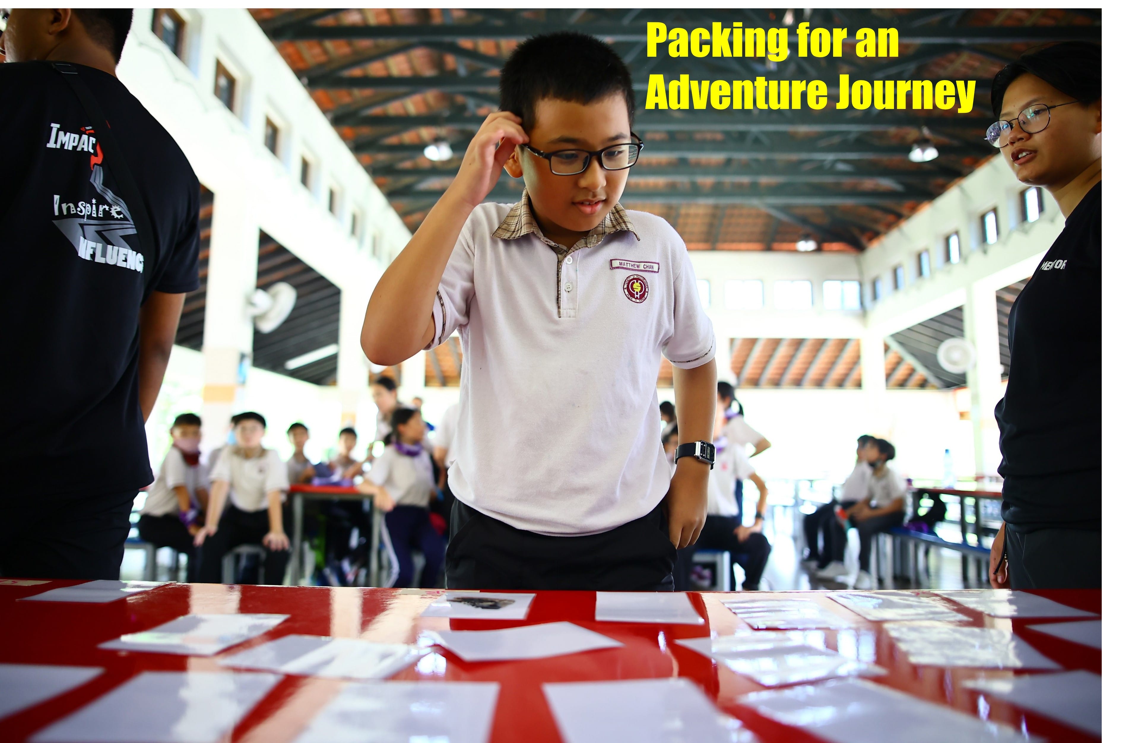 A P5 boy packing for an adventure journey